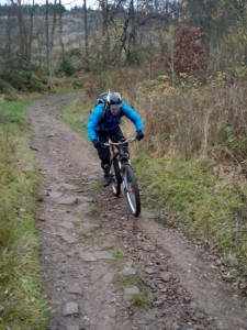 Matt descending the cycle trail in Macc Forest.  